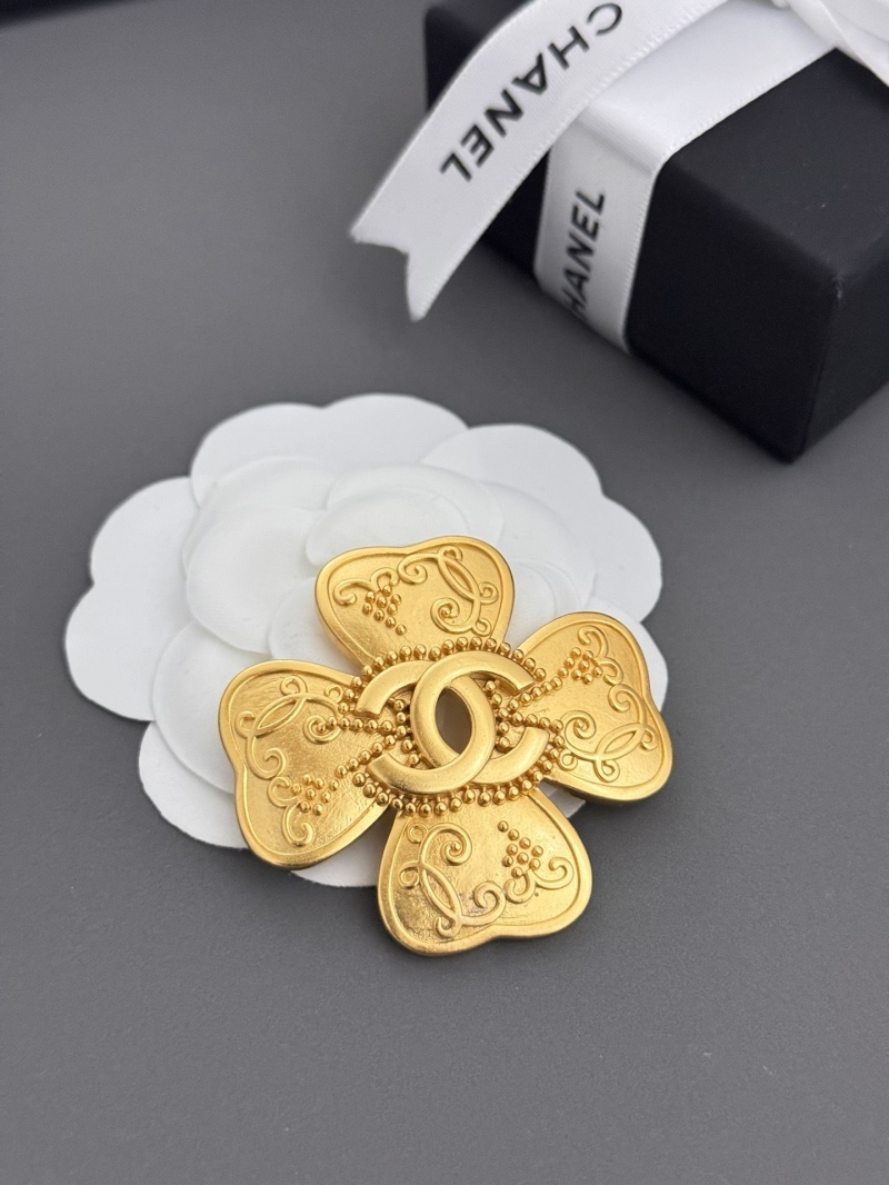 Ch**el brooches